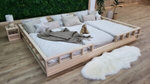 Familienbett mit Rausfallschutz. Schlafkomfort und Sicherheit für die ganze Familie.