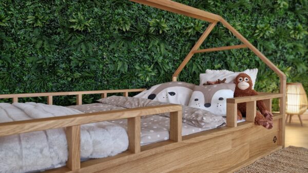 hausbett mit rausfallschutz – detailansicht einstieg mit erhöhter einfassung