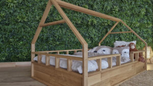 hausbett mit rausfallschutz – ecke vorne mit erhöhter einfassung