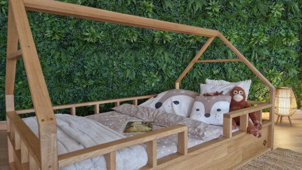 hausbett mit rausfallschutz – seitenansicht mit erhöhter einfassung